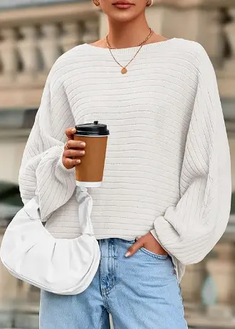 Oversized boat neck knit sweater styled with jeans for a casual fall outfit