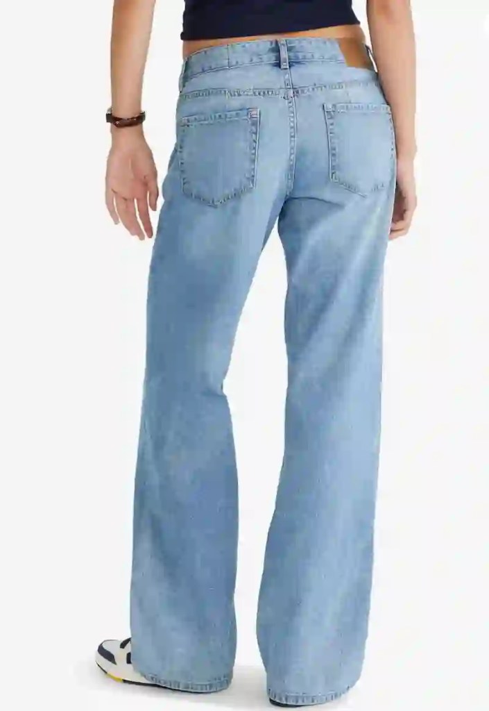 Low rise baggy wide leg jeans for women styled as a casual millennial mom everyday outfit for relaxed capsule wardrobe fashion