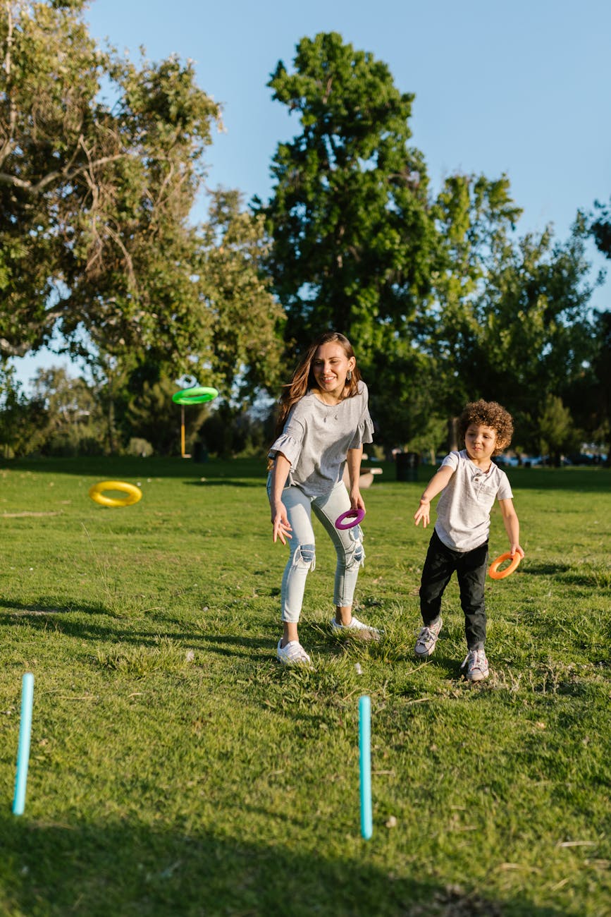 Mom playing ring toss with her son instead of spending all day in the kitchen