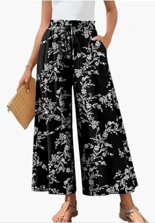 Flowy wide-leg palazzo pants with elastic waist and pockets, perfect for casual or dressy occasions